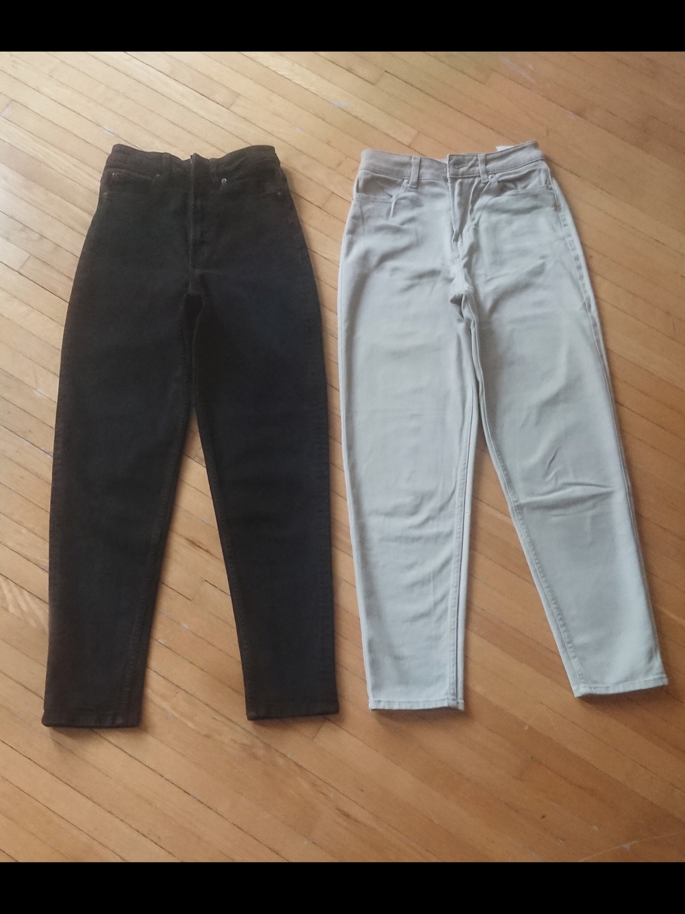 Two pairs of high-rise jeans - black Tapered & biege Straight, size 2